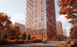 Оранжевая сетка фасада ЖК НЕКСУС от Аквилон — ракурс снизу вверх на угол башни с панорамными окнами