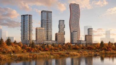Башни ЖК Ситизен у воды на фоне осеннего парка и набережной Сходненского канала